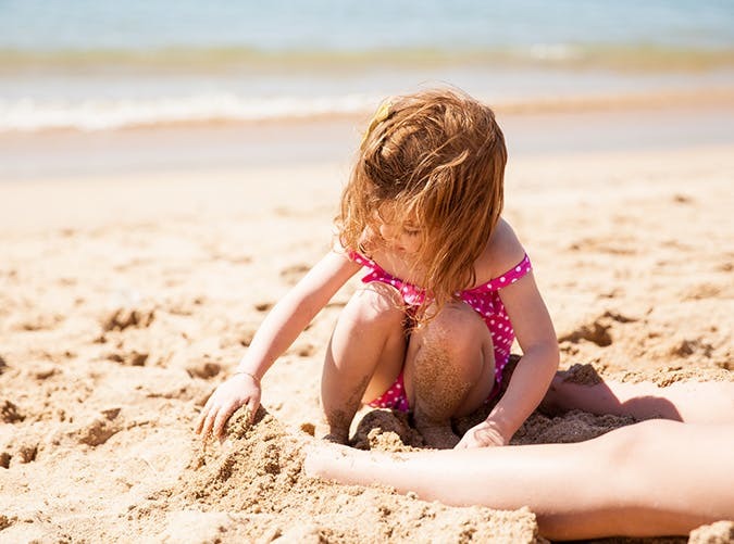 summer kids bury sand